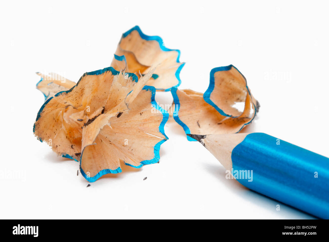 pencil with shavings after being sharpened isolated on white Stock Photo