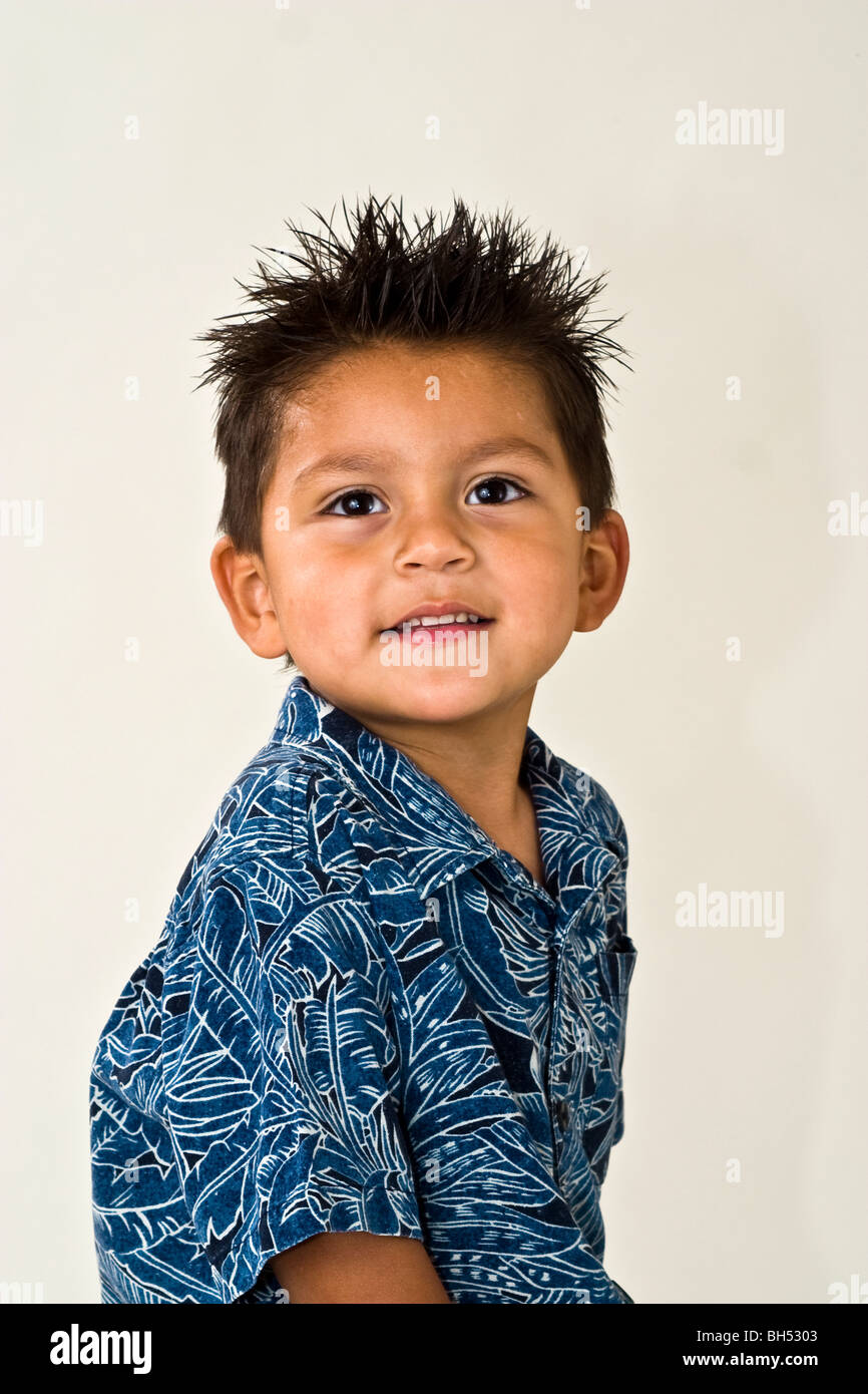 little boy Hispanic 3-4 years old boy studio shot. eye contact looking at camera  MR  © Myrleen Pearson Stock Photo