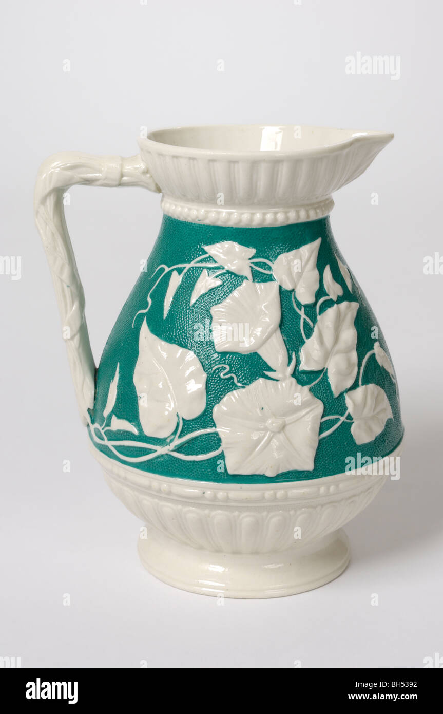A Victorian English jug  relief moulded with a Convolvulus design. 16cm high, circa 1872, manufactured by Bates Elliott & Co. Stock Photo