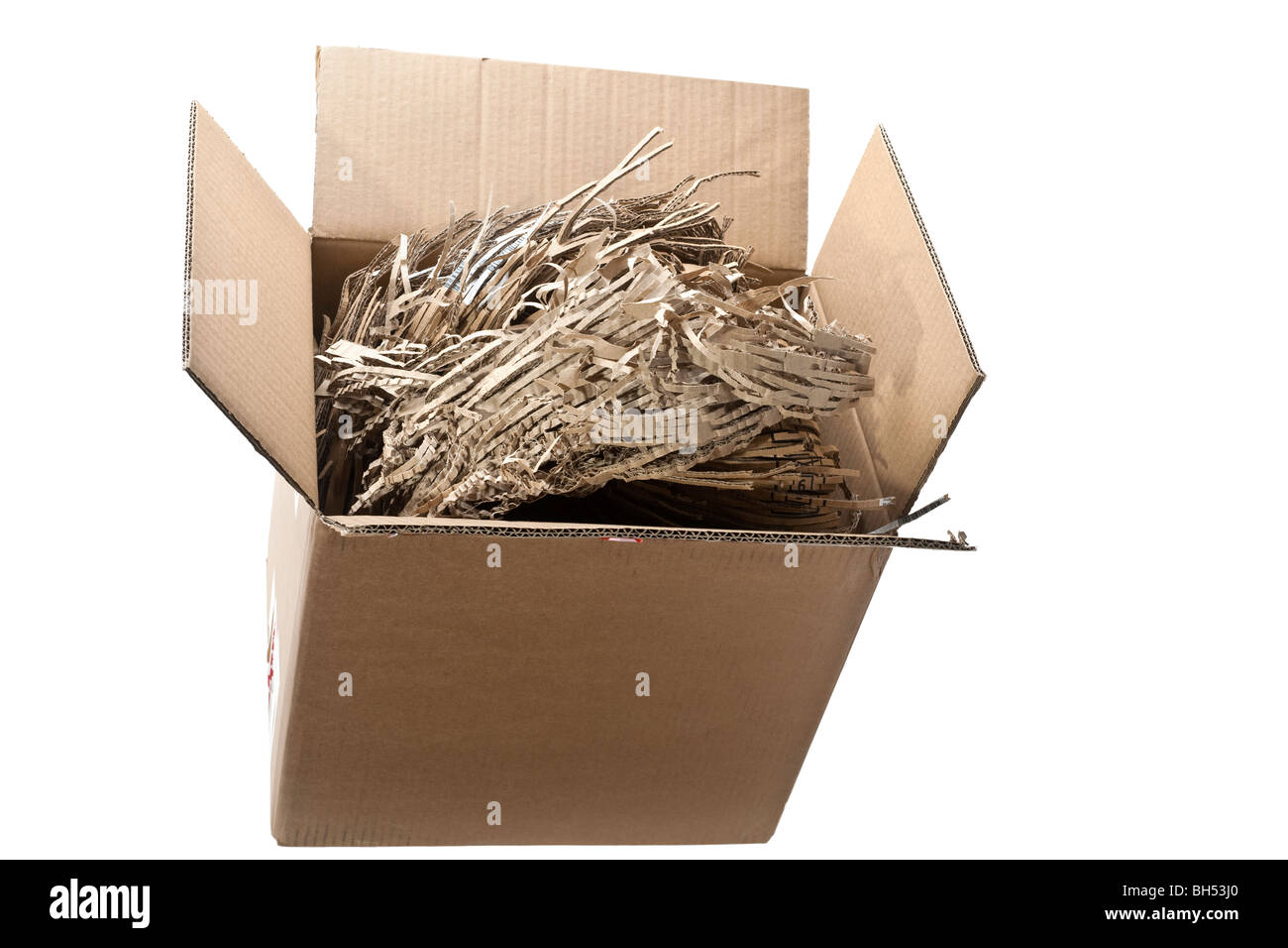 Brown shredded paper, strips of sliced corrugated eco paper for packing  Stock Photo - Alamy