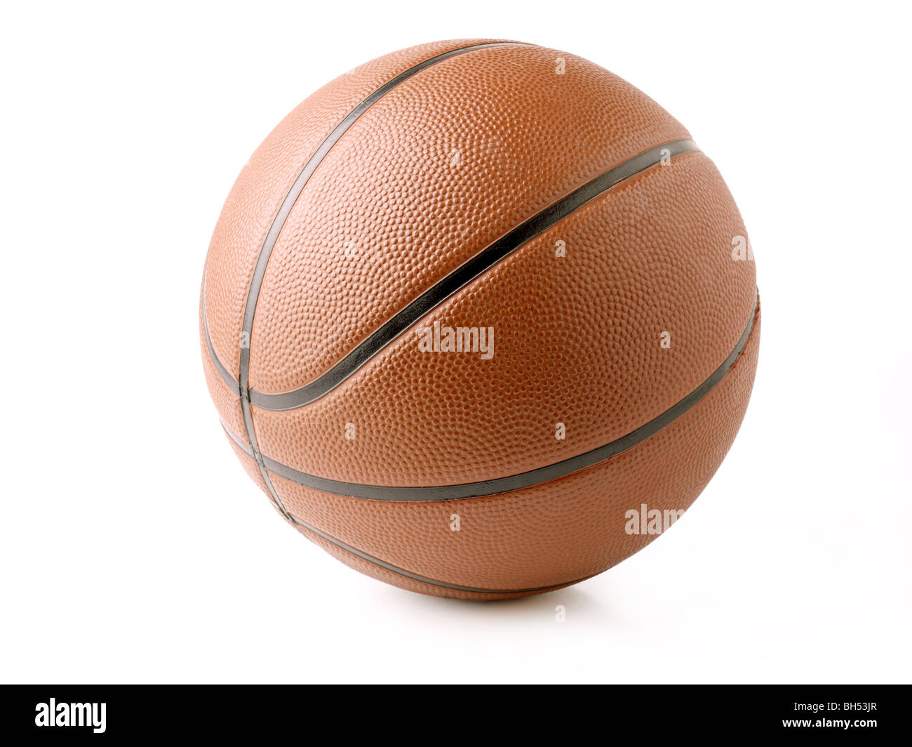 Studio shot of orange basketball over white background Stock Photo