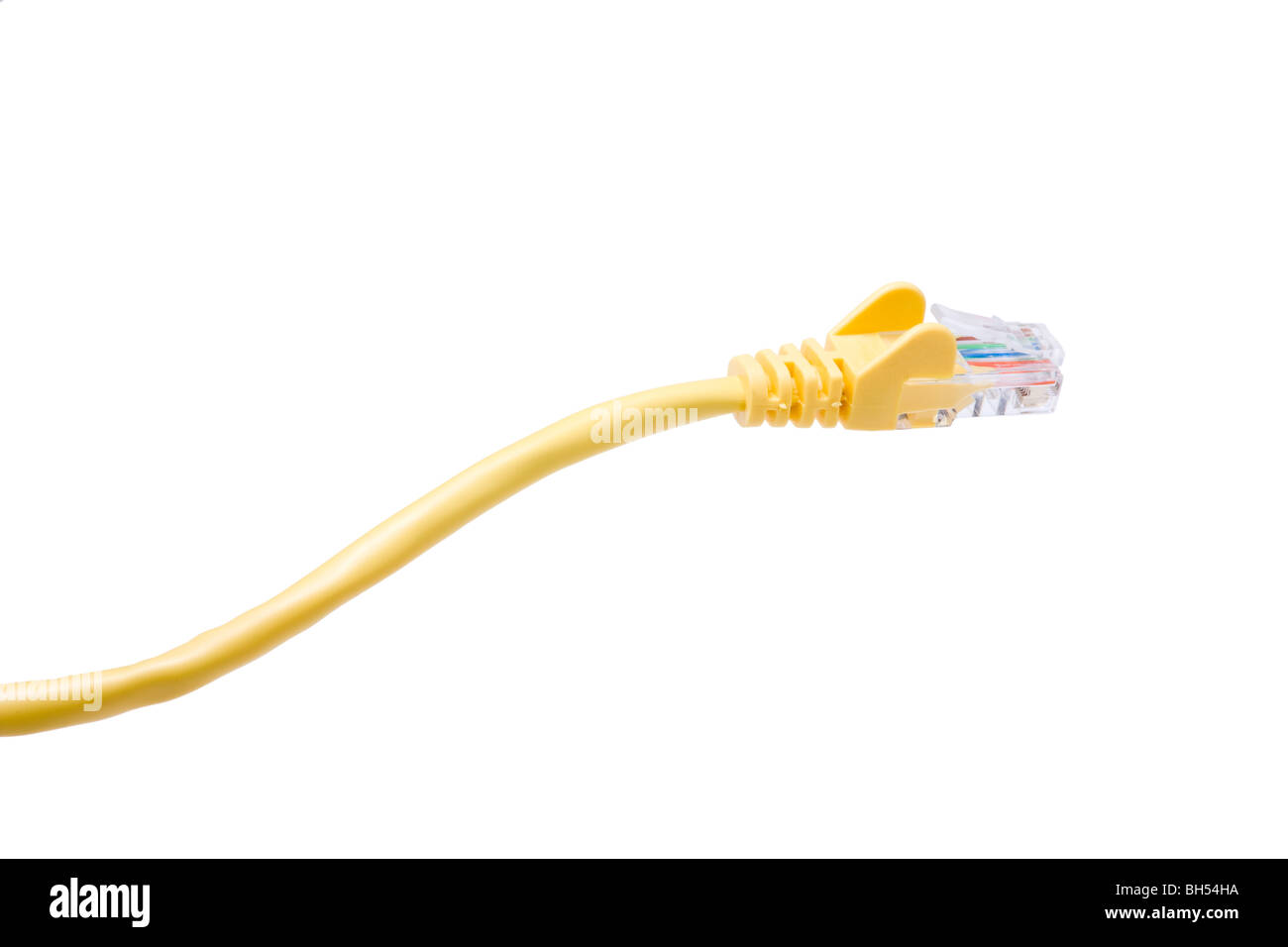 Yellow Network Cable with molded RJ45 plug isolated against white background. Stock Photo