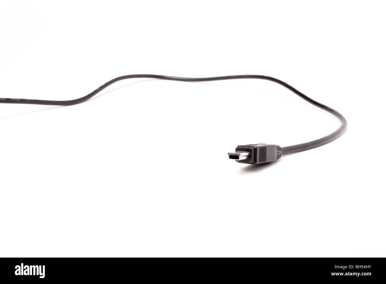 Black Mini USB Cable close up isolated against white background. Stock Photo