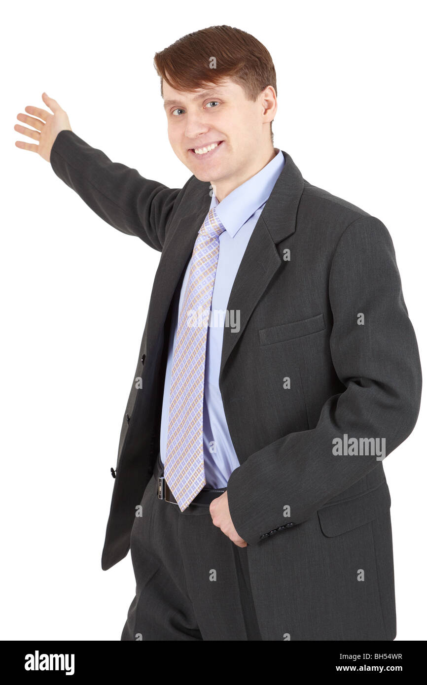 Hospitable businessman in a business suit isolated on white background ...