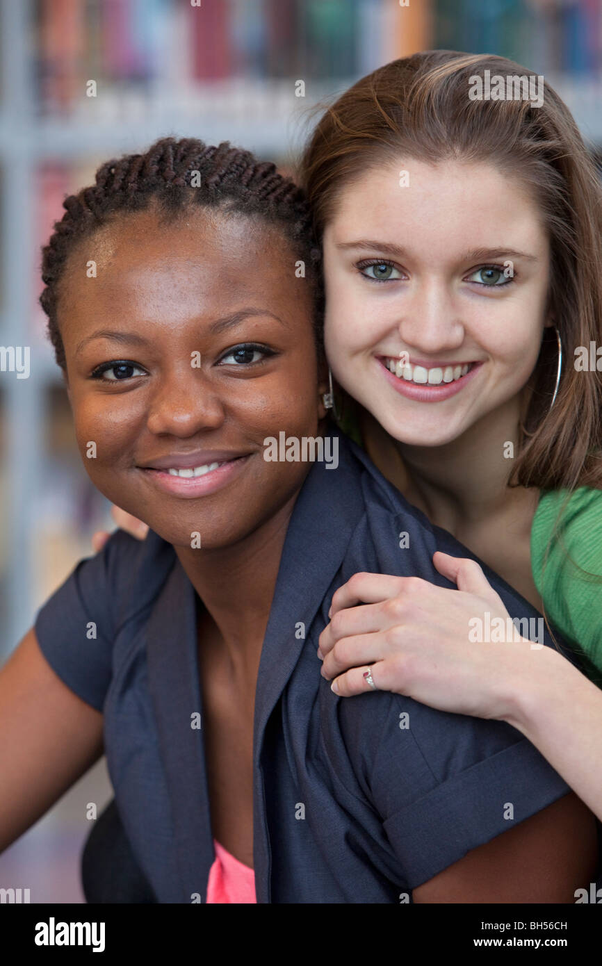 Portrait of two teenage girls looking into the camera Stock Photo