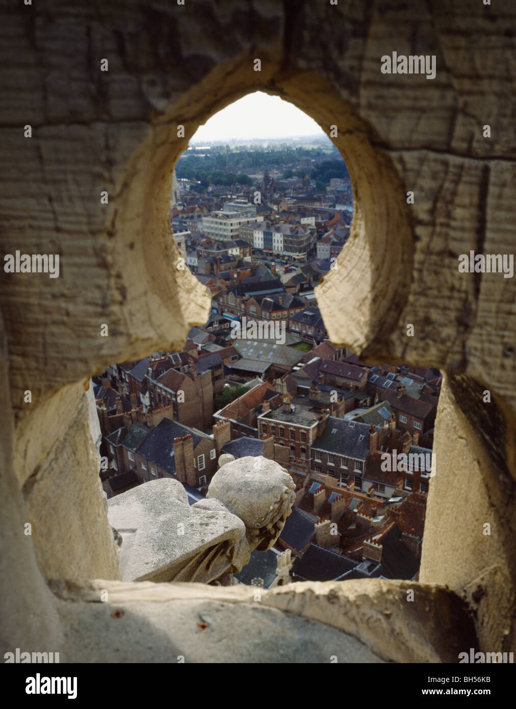 York : city seen through parapet opening of center tower of York Minster, built 1420-30 after collapse of 13th center tower Stock Photo