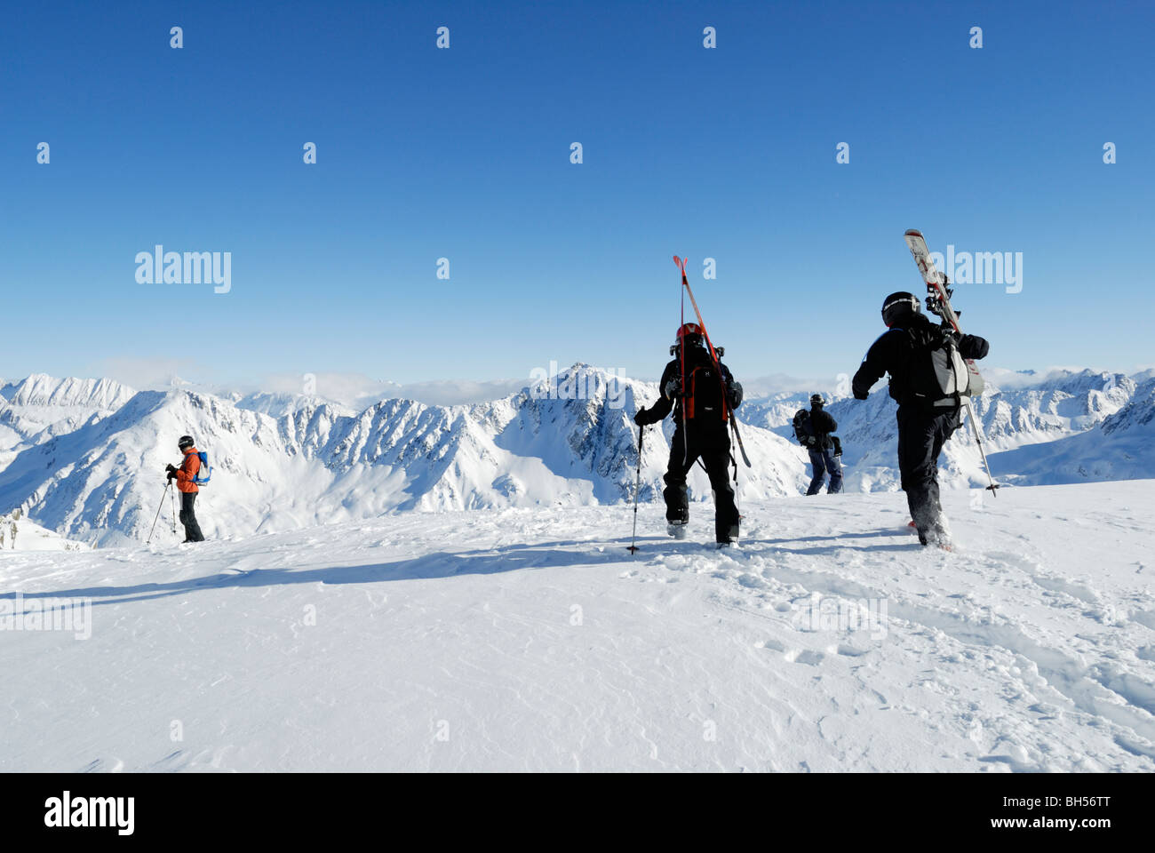 Skiers hiking in off-piste terrain, Gemstock, Andermatt, Swiss Alps Stock Photo