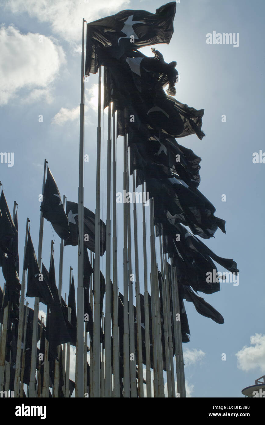 138 huge black flags bearing a white star in front of the U.S. diplomatic mission in Havana to mourn for the victims of the 1961 Stock Photo