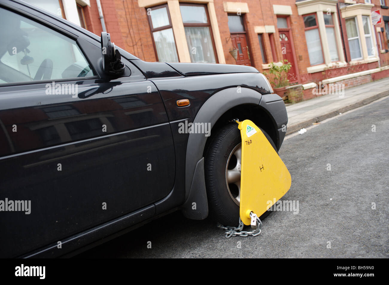 A wheel clamp fitted to a car by the DVLA to a car without a valid TAX