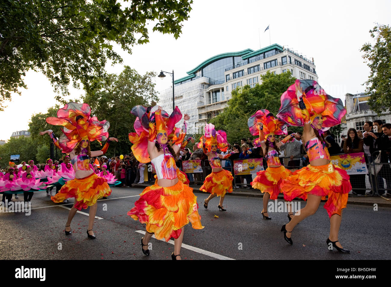 Performers during carnival parade at THAMES FESTIVAL, London, United Kingdom Stock Photo