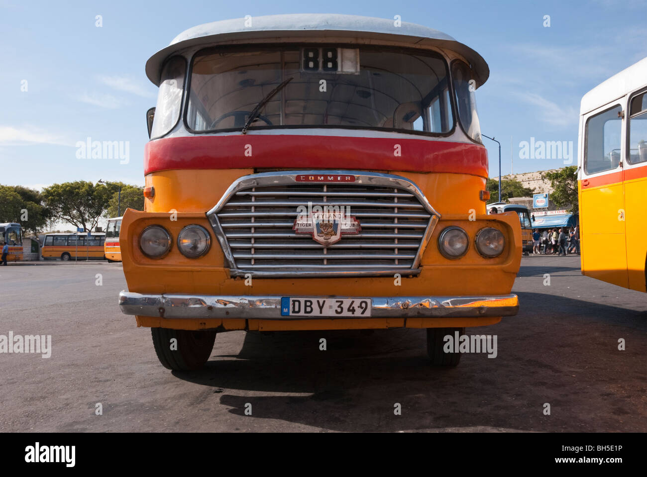 Classic Maltese bus characterised by it's colourful paint work at the Bus Station, Valetta, Malta, Europe. Stock Photo