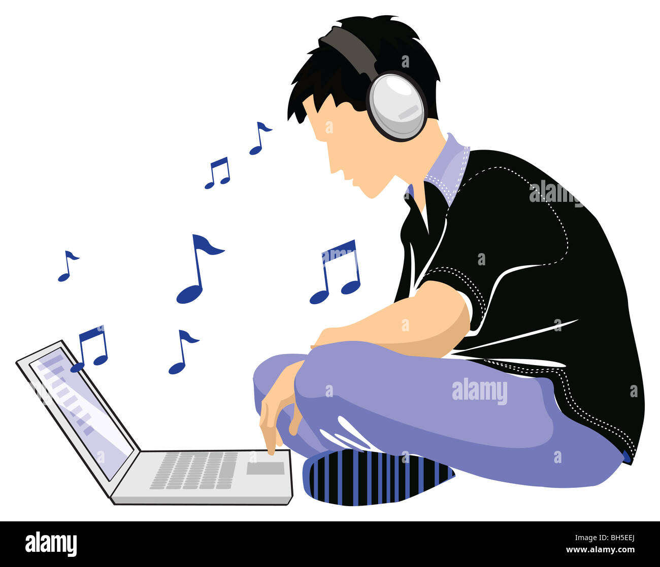 boy listening to music from laptop using headphones Stock Photo Alamy
