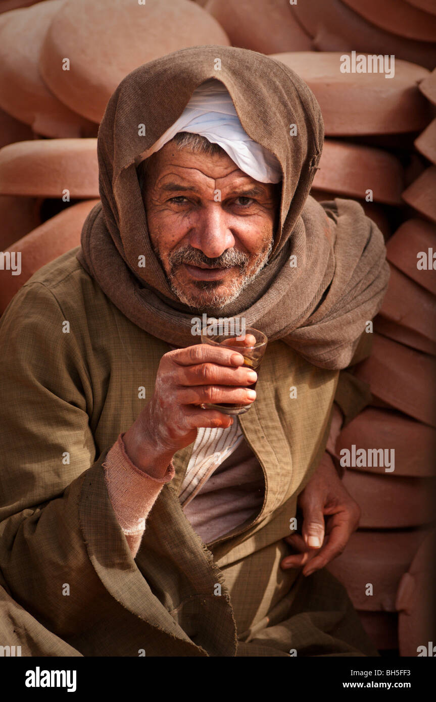 Egyptian man drinking a cup of tea Stock Photo Alamy
