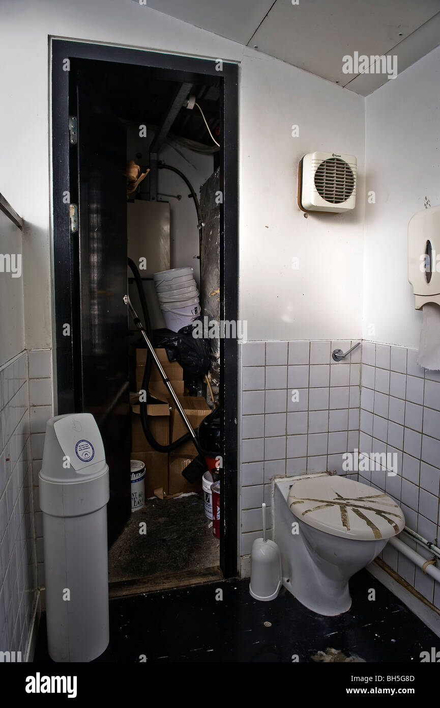 a toilet and store room Stock Photo Alamy