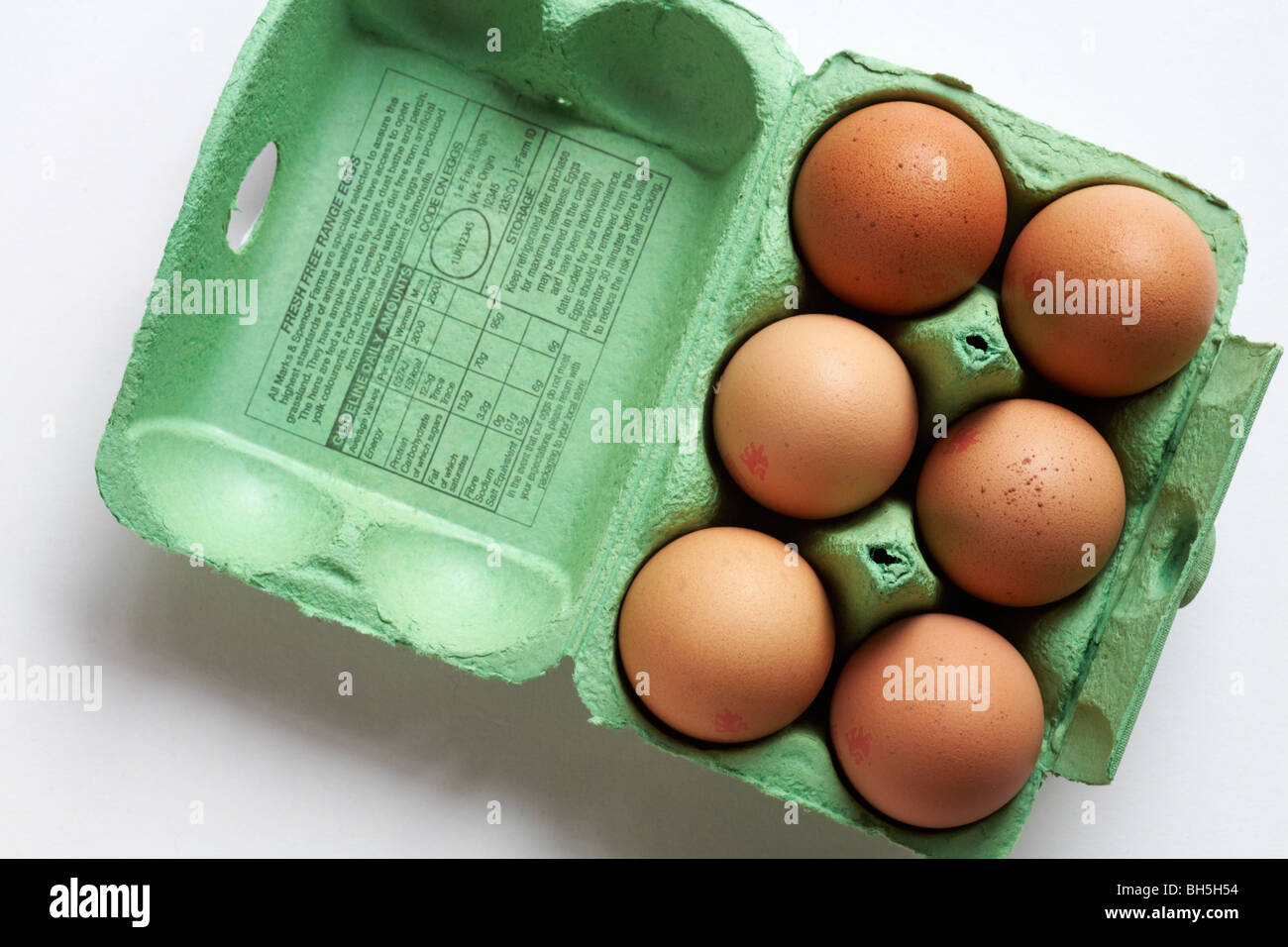Egg box opened showing 6 free range large eggs from Marks & Spencer