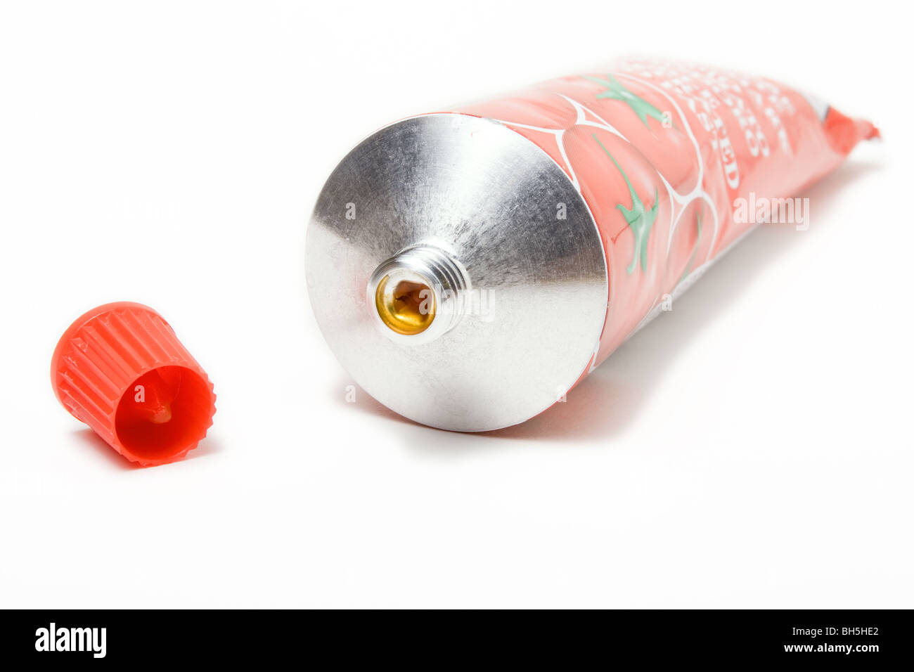 Tomato Puree Tube from low viewpoint isolated against white background