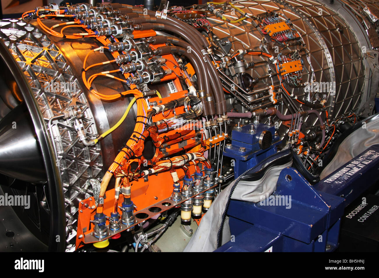 Detail of control circuits on the outside case of a modern turbojet engine. Stock Photo