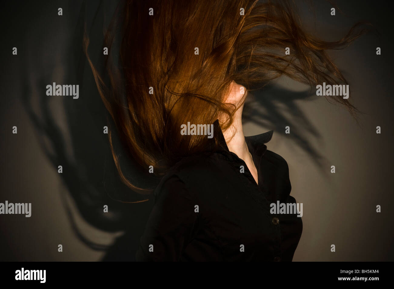 a young girl throws her hair back Stock Photo Alamy