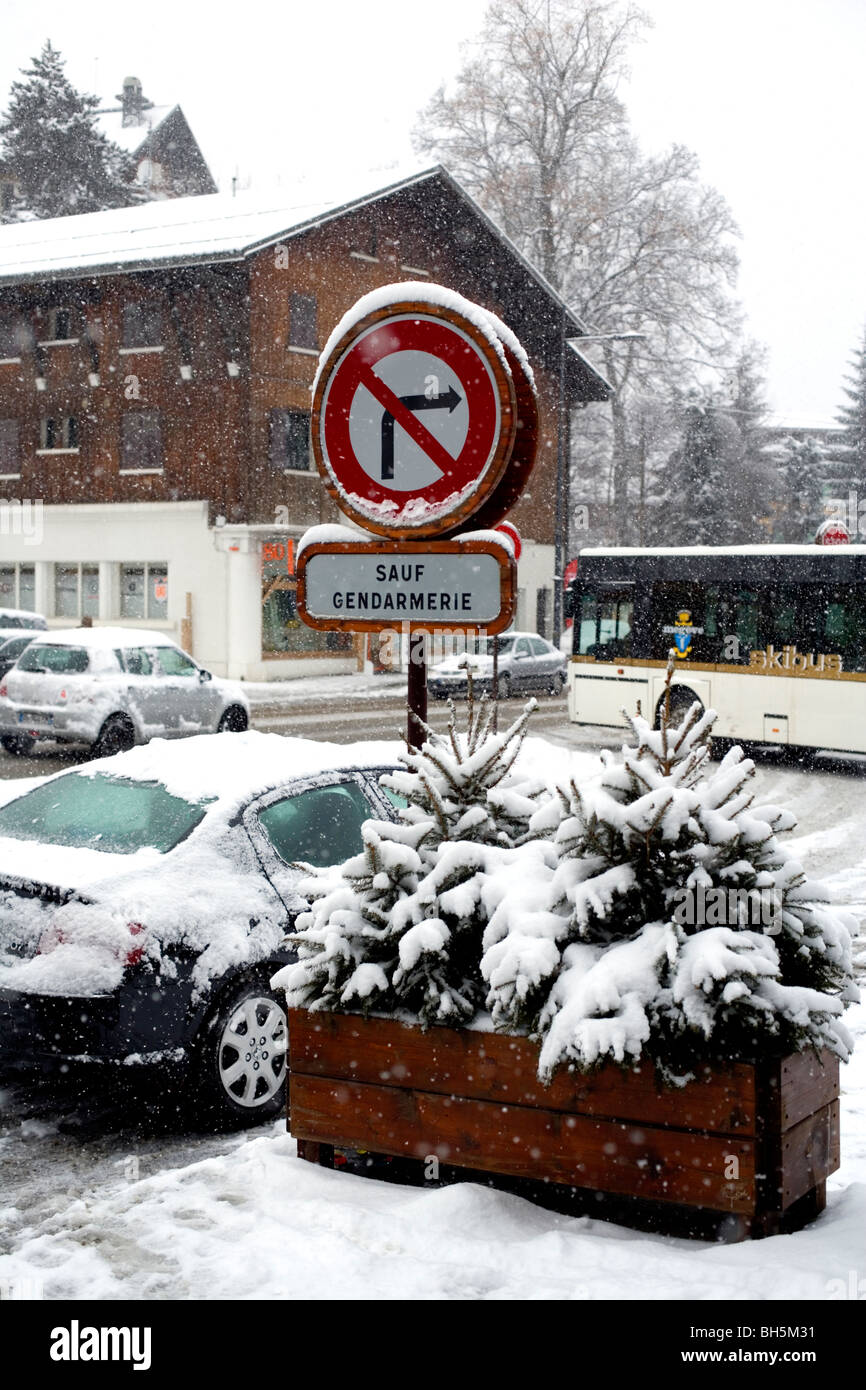 Snow scene.Traffic sign 'Sauf Gendarmerie'. Megève, Haute Savoie, France, Europe Stock Photo