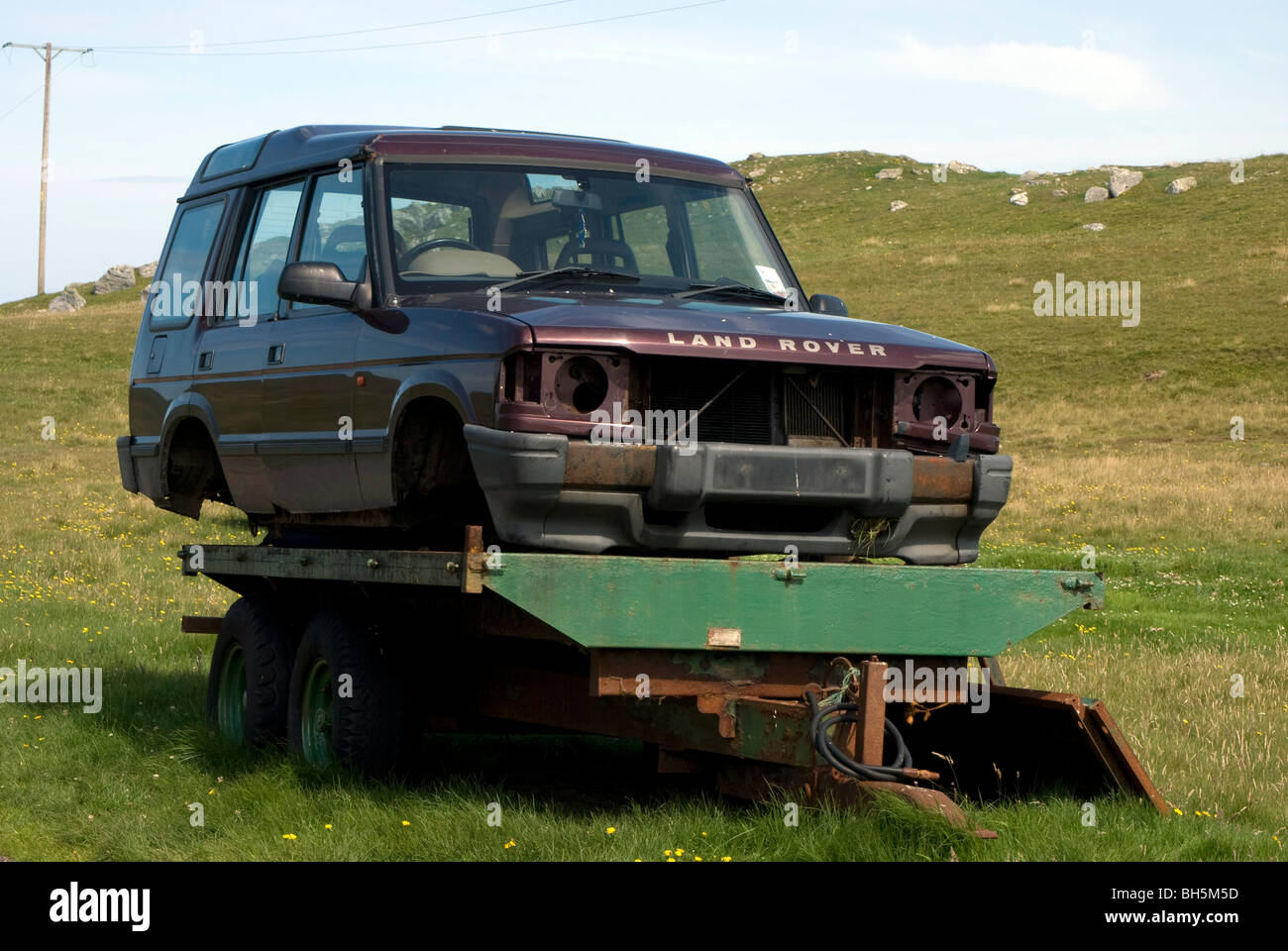 Abandoned Land Rover car at Strathy Point on the north coast of