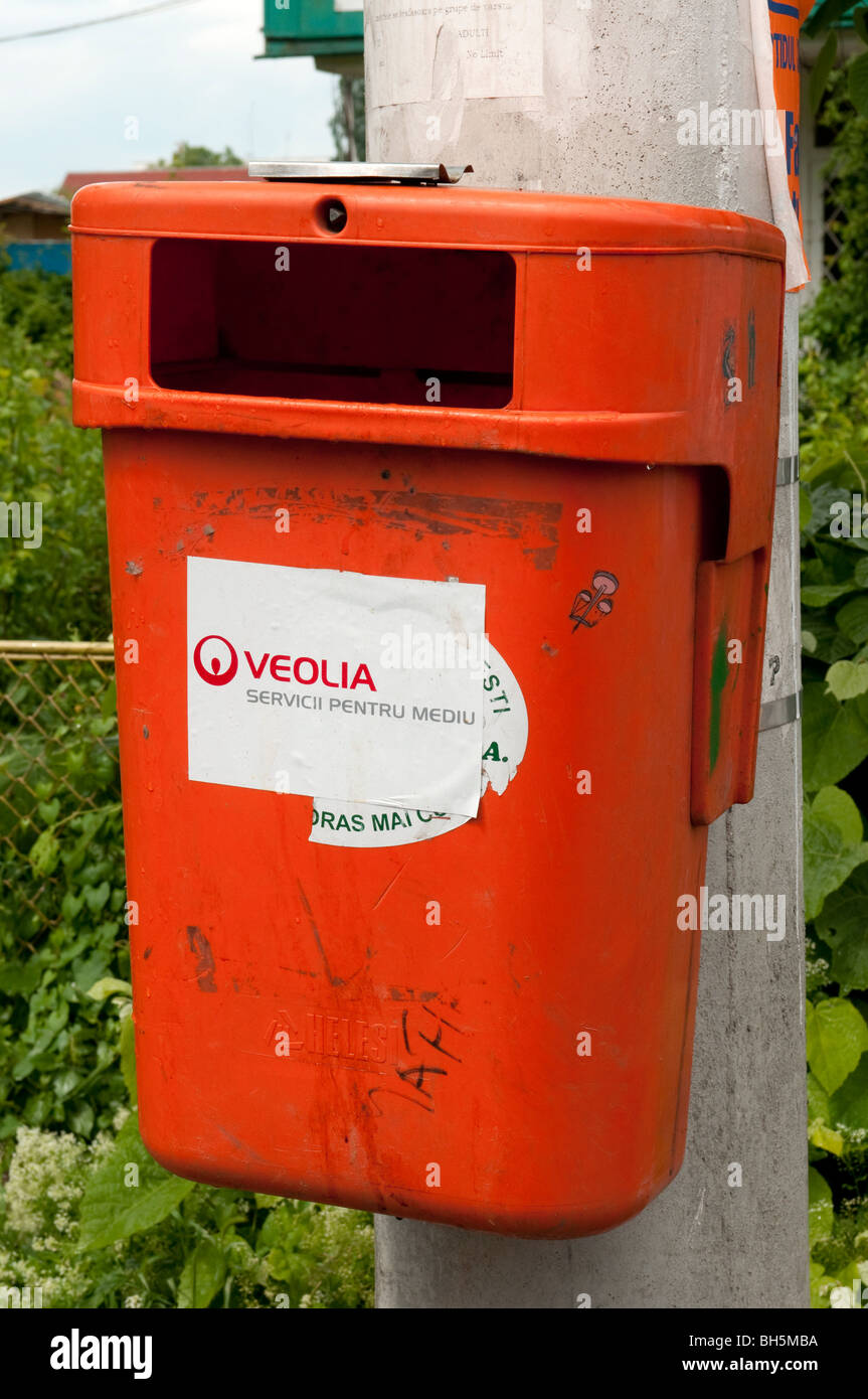 Veolia red rubbsih bin trash can Ploiesti Prahova Romania Eastern Europe Stock Photo