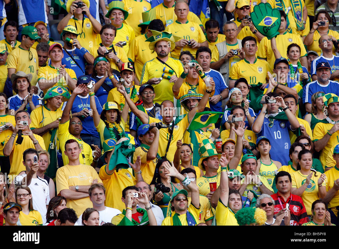 Brazilian fans sing in the stands at the 2006 Football World Cup Stock Photo