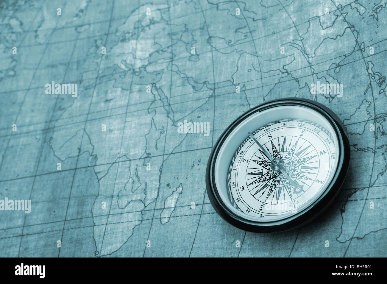 Compass and Chess on old map Stock Photo by ©kwanchaidp