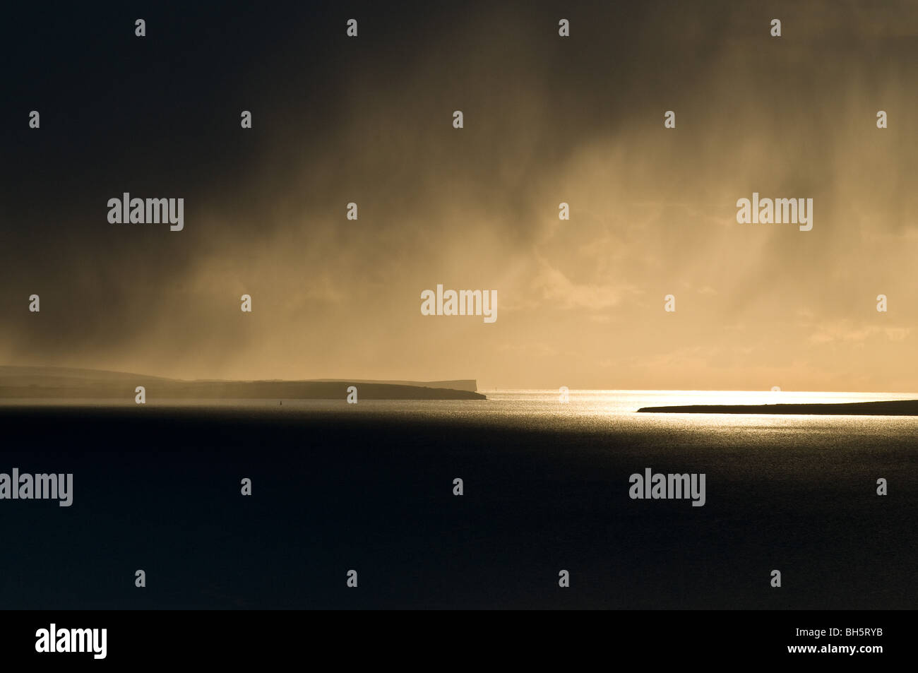 dh Hoxa Sound SCAPA FLOW ORKNEY atmospheric snow clouds sunlight hoxa head islands weather skyscape winter Stock Photo