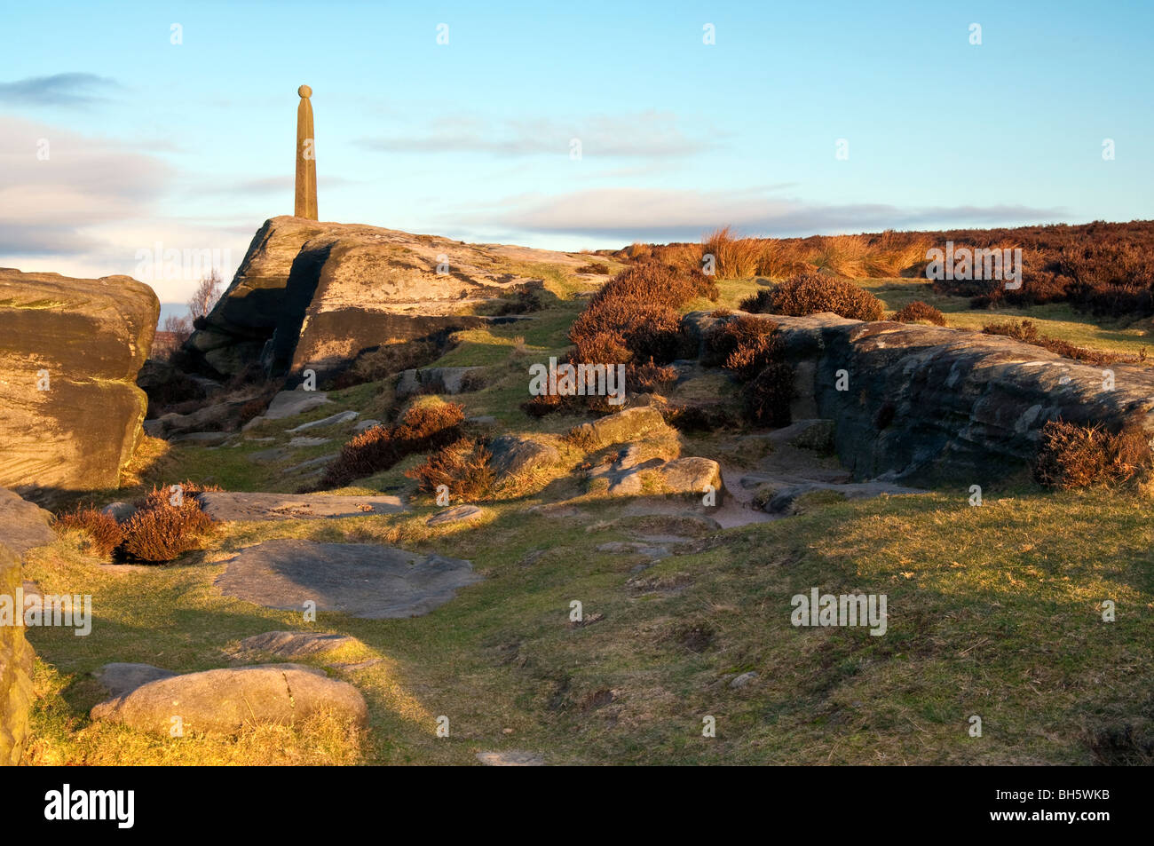 Sunrise on Birchen Edge in the Peak District with Nelson's Monument standing on the edge. Stock Photo