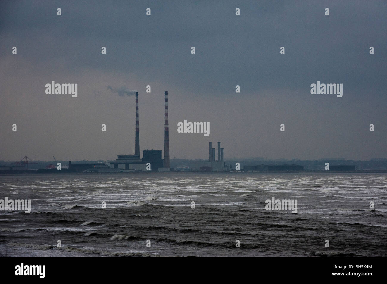 Stormy weather blowing into Sandymount strand on a cold wet winters day in Dublin. Stock Photo