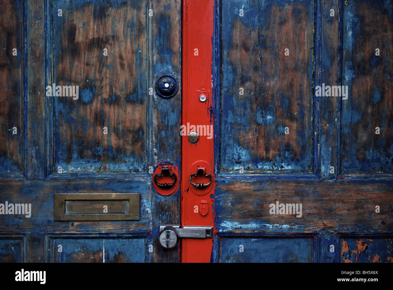 Stripped blue and red door Stock Photo