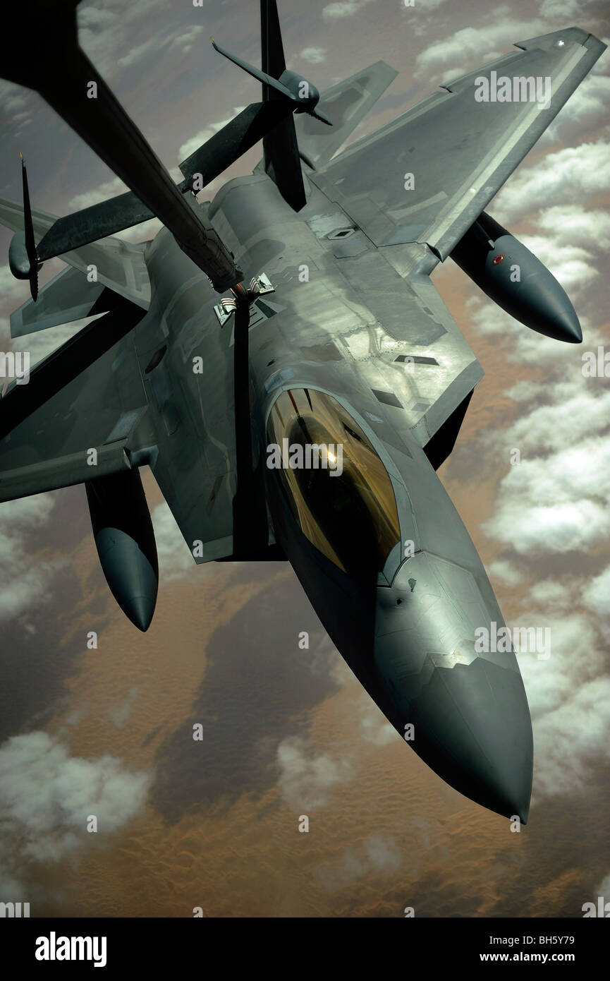 December 9, 2009 - A U.S. Air Force F-22 Raptor is refueled by a KC-10A Extender aircraft over southwest Asia. Stock Photo