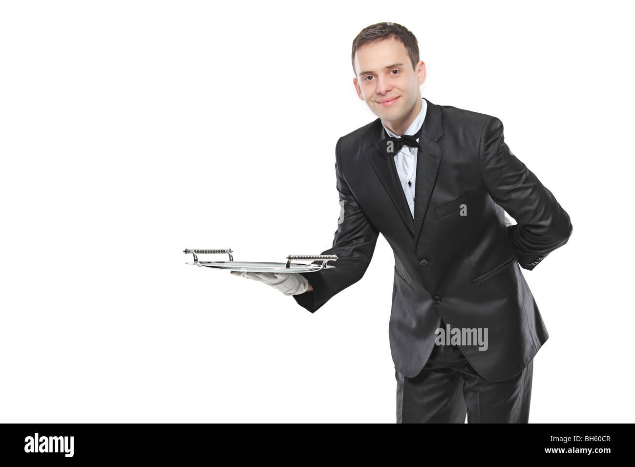 Waiter carrying an empty tray isolated on white background Stock Photo