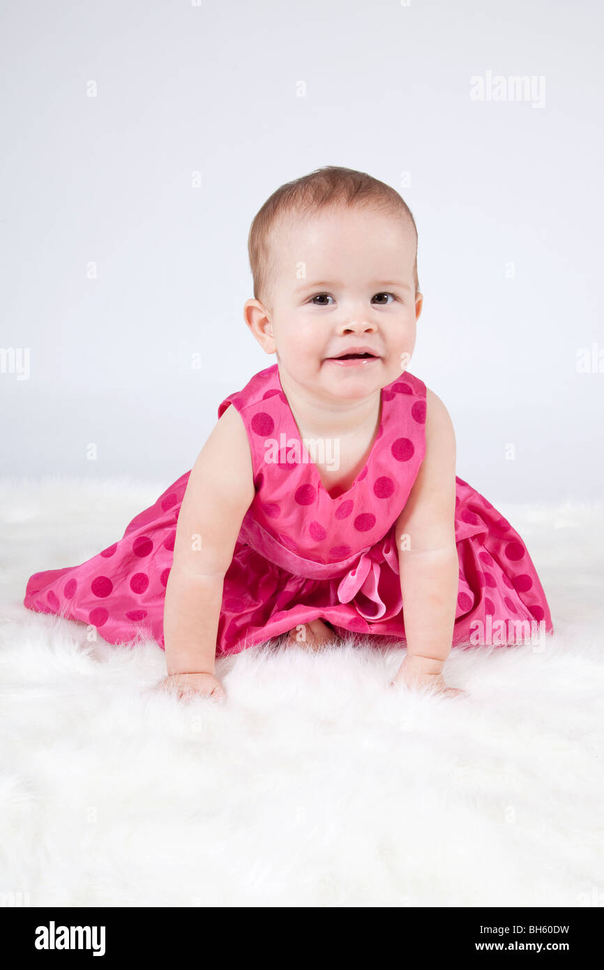 Cute Baby girl in pink dress Stock Photo - Alamy