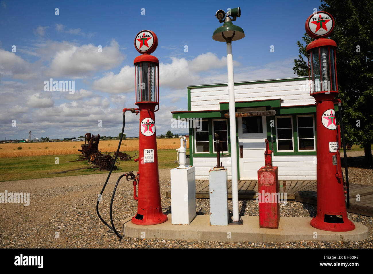 Old red petrol pumps at Big Horn County Historical Museum Hardin, Montana, USA Stock Photo