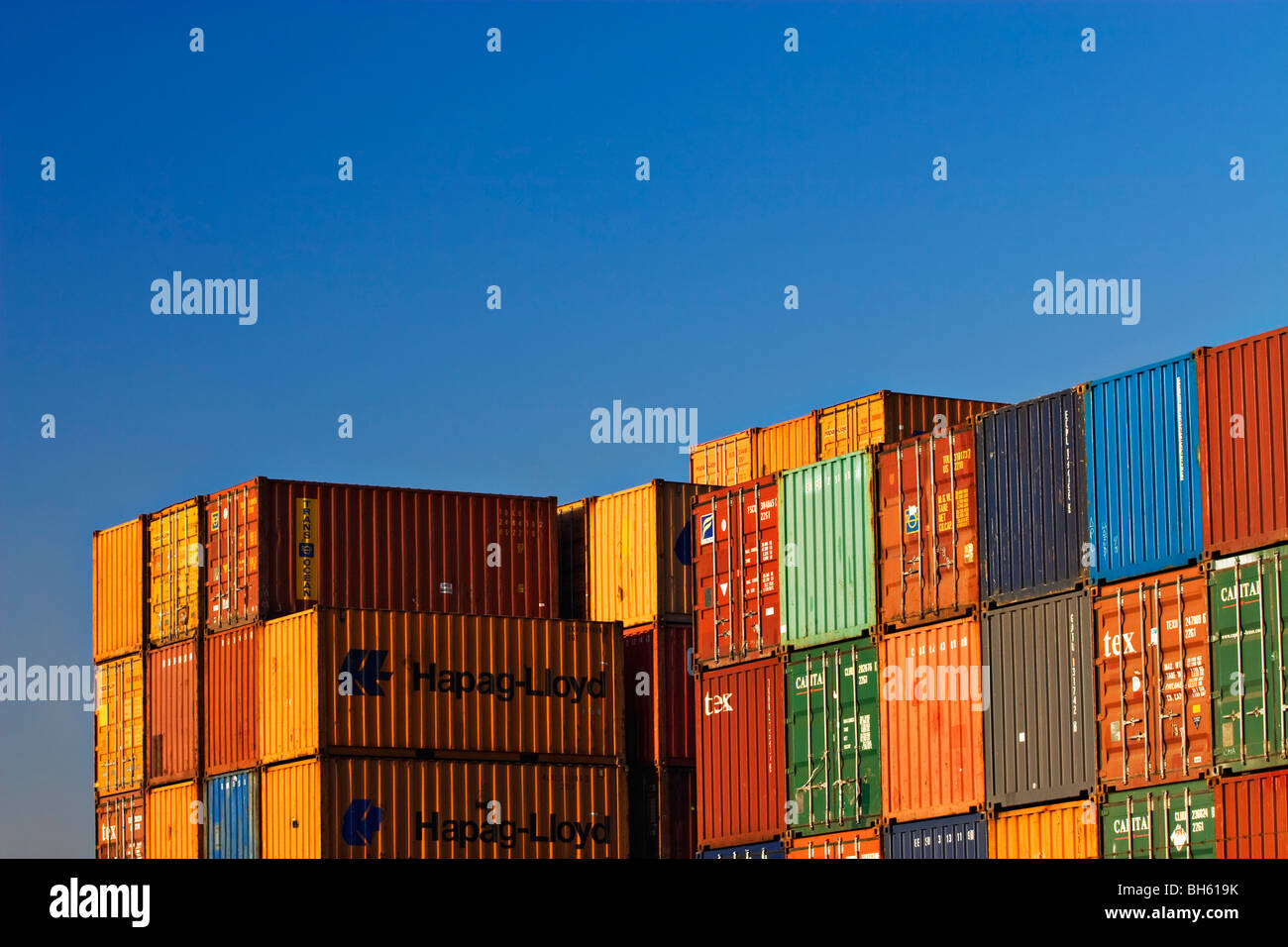 Shipping industry / Shipping containers stacked high in the Port of Melbourne / Melbourne