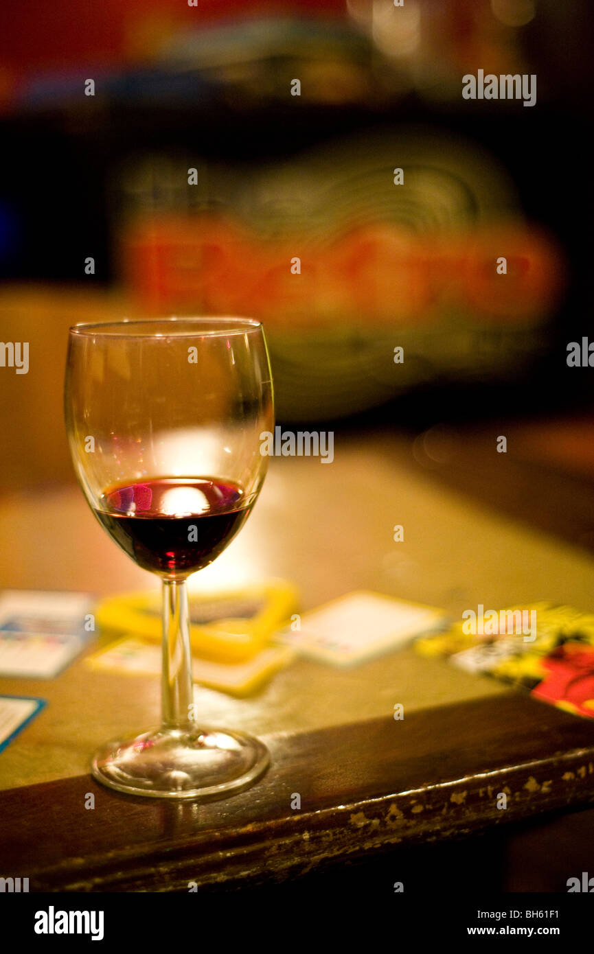 Glass Of Wine On Bar In Pub High Resolution Stock Photography and