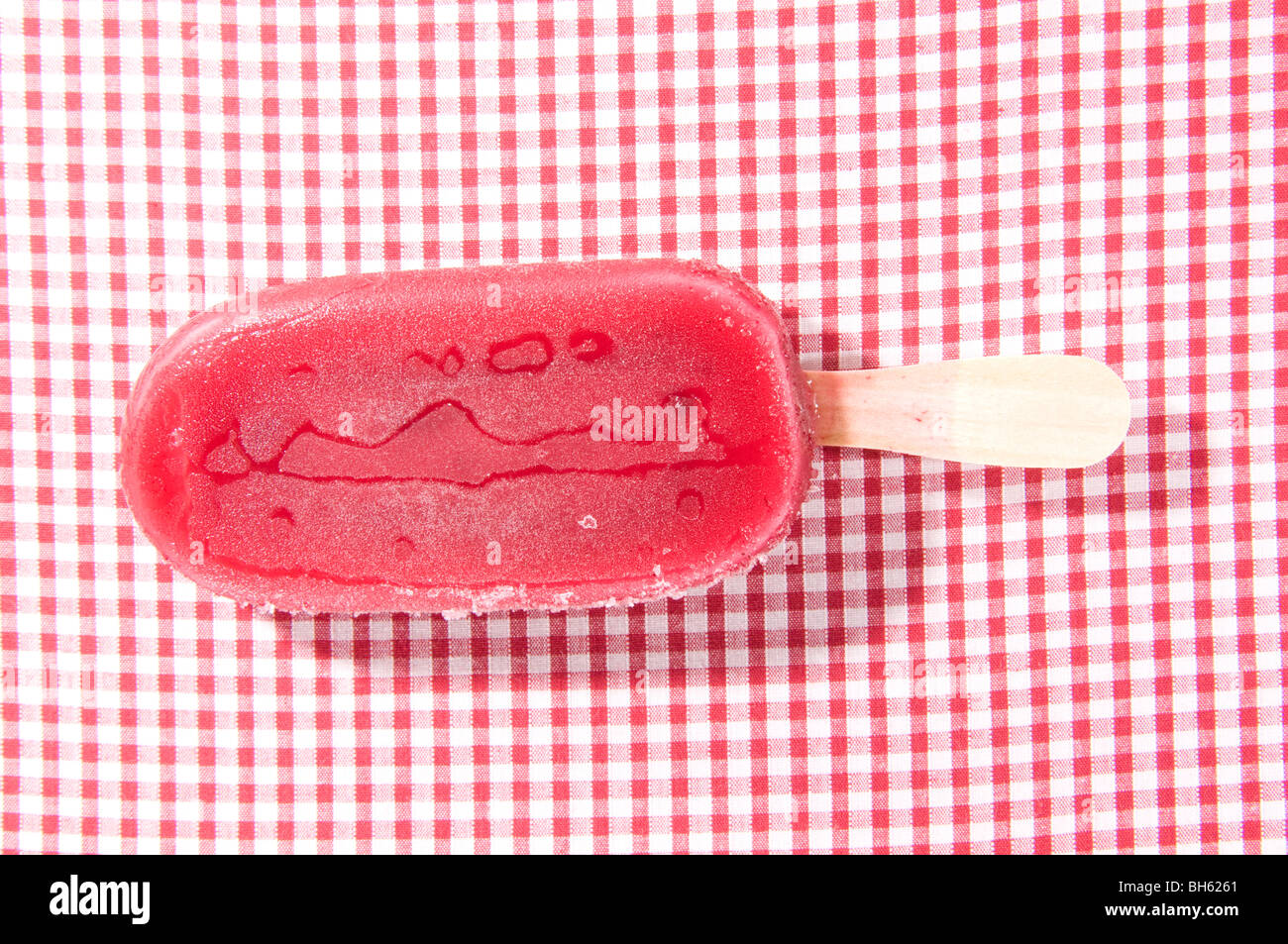 Ice Lolly On A Gingham Background Stock Photo