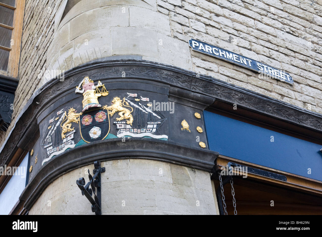 Decorative coat of arms and the beginning of Parchment Street