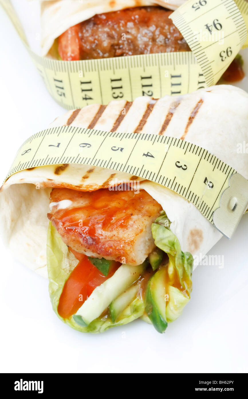 Tortilla wrap with tape measure Stock Photo
