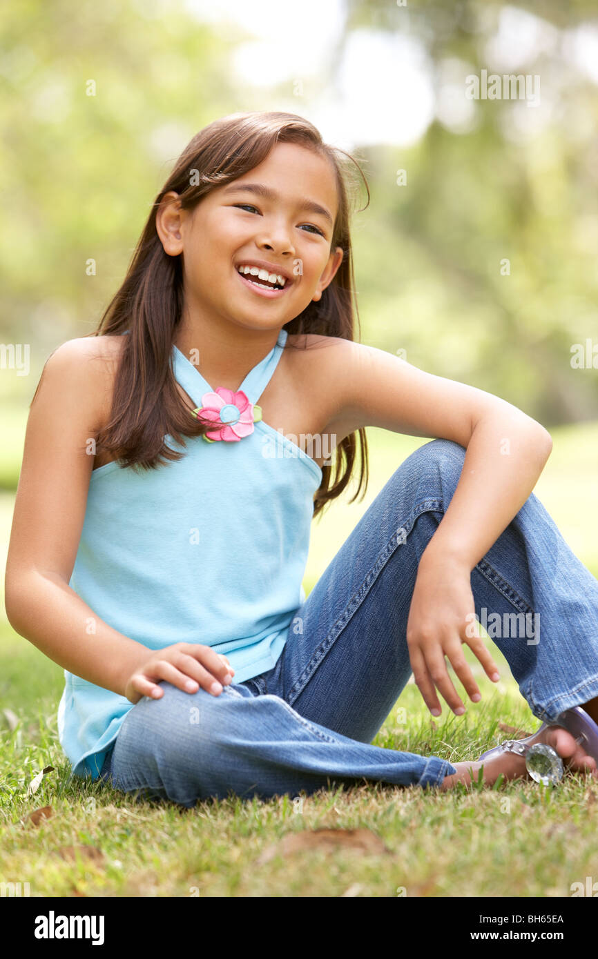 Portrait Of Young Girl In Park Stock Photo - Alamy