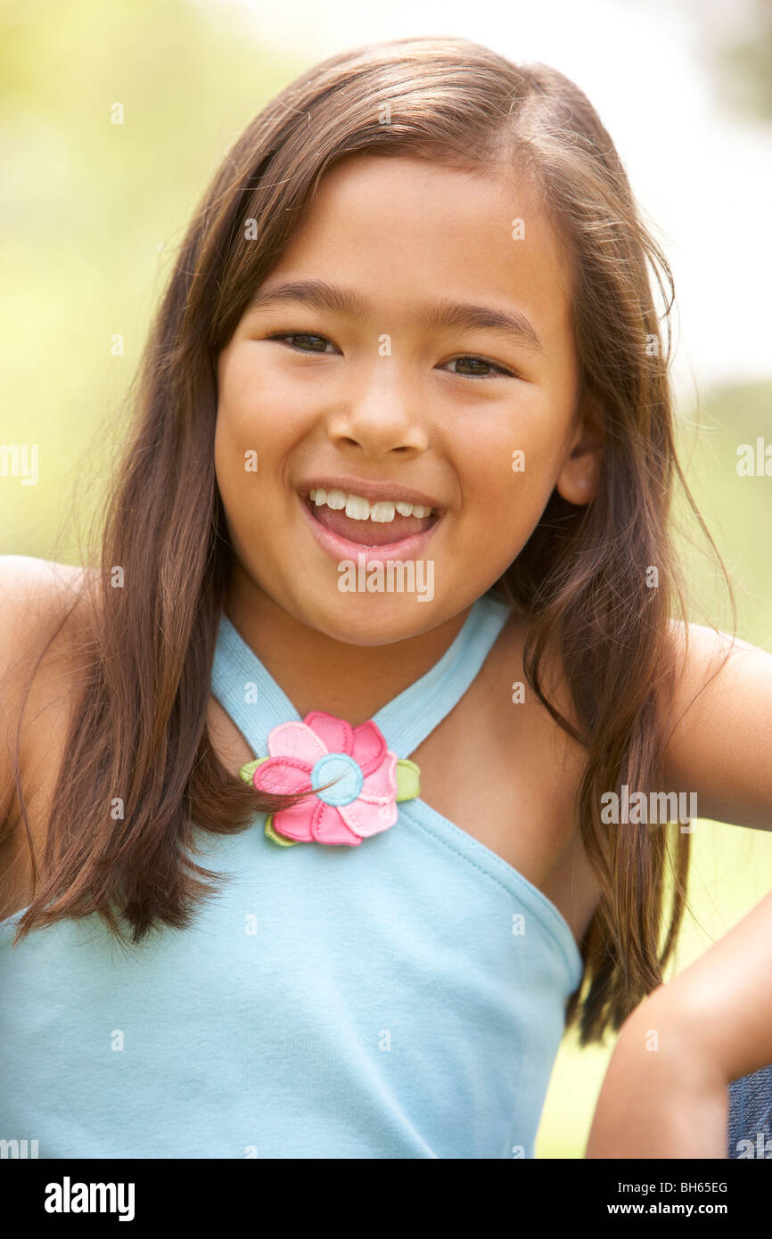 Portrait Of Young Girl In Park Stock Photo - Alamy