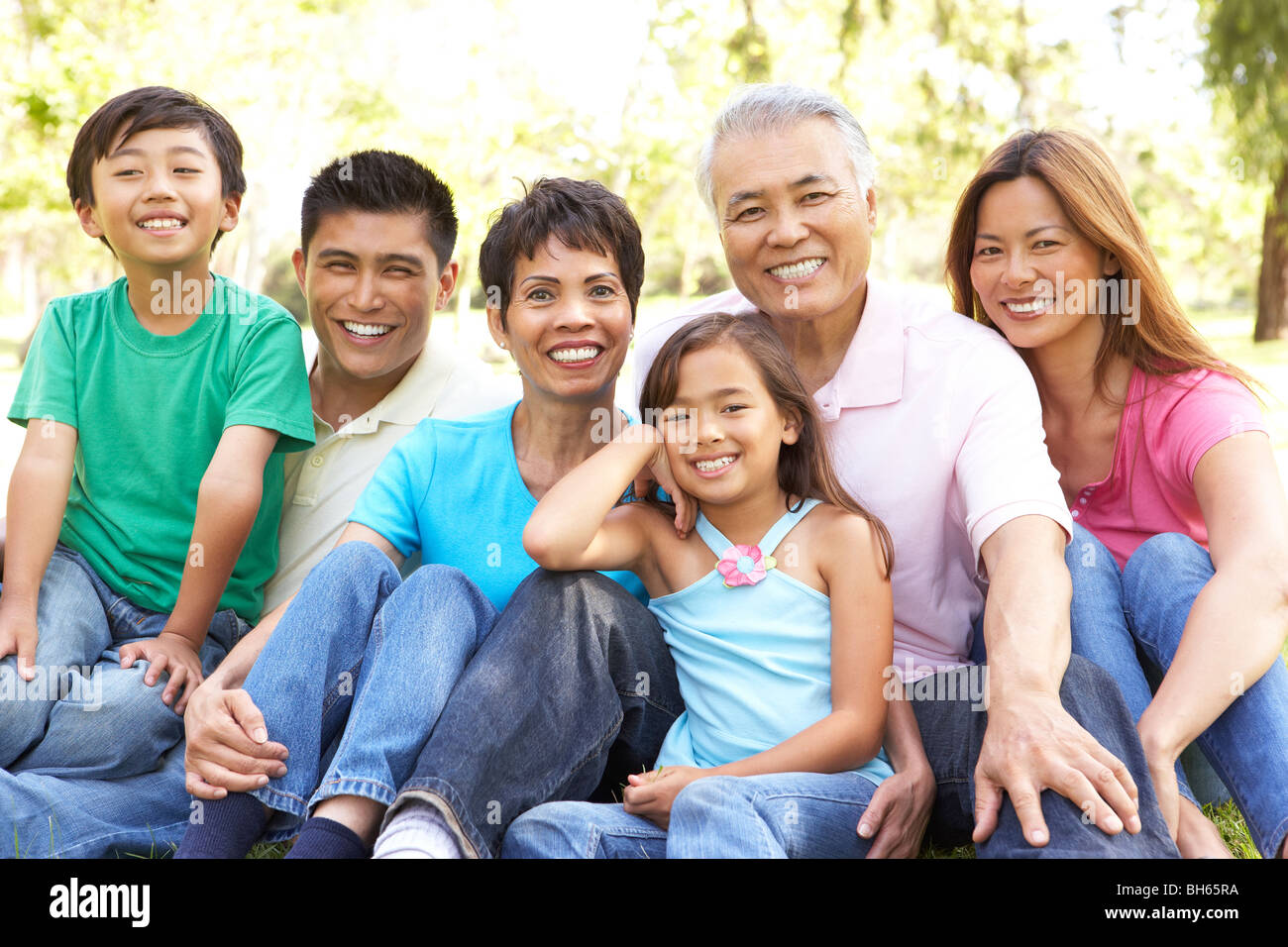 Portrait Of Extended Family Group In Park Stock Photo