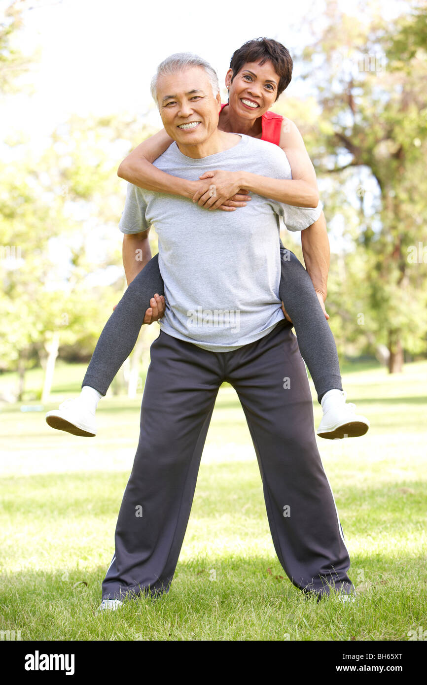 Senior Couple Working Out In Park Stock Photo - Alamy
