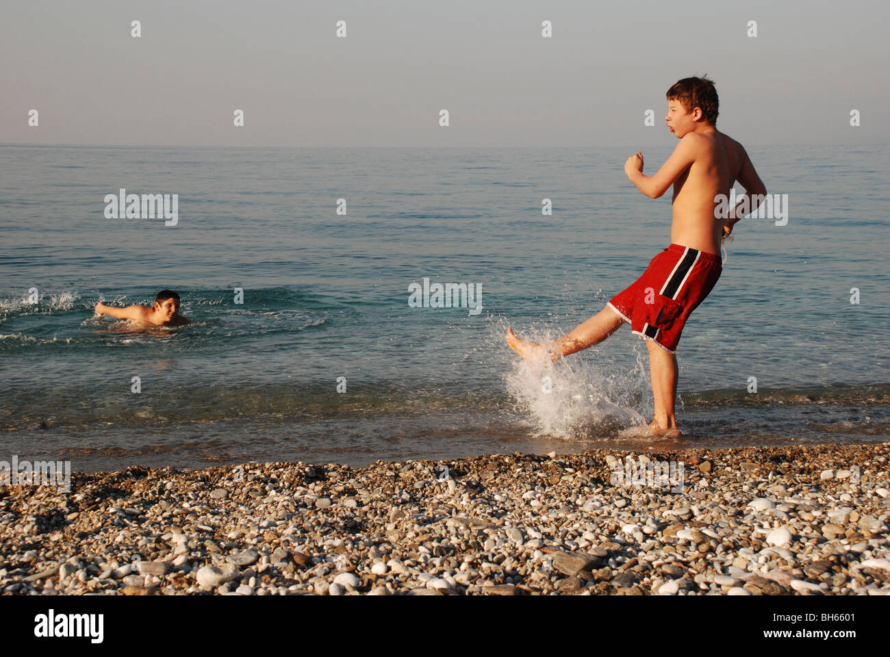 Boys in shorts hi-res stock photography and images - Alamy