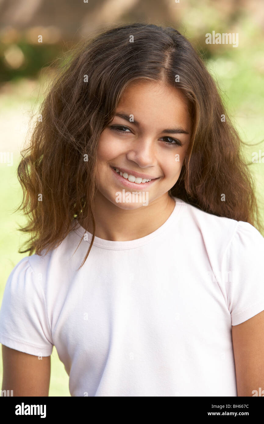 Portrait Of Young Girl In Park Stock Photo - Alamy