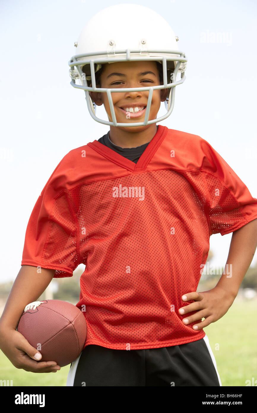 Young Boy Playing American Football Stock Photo Alamy