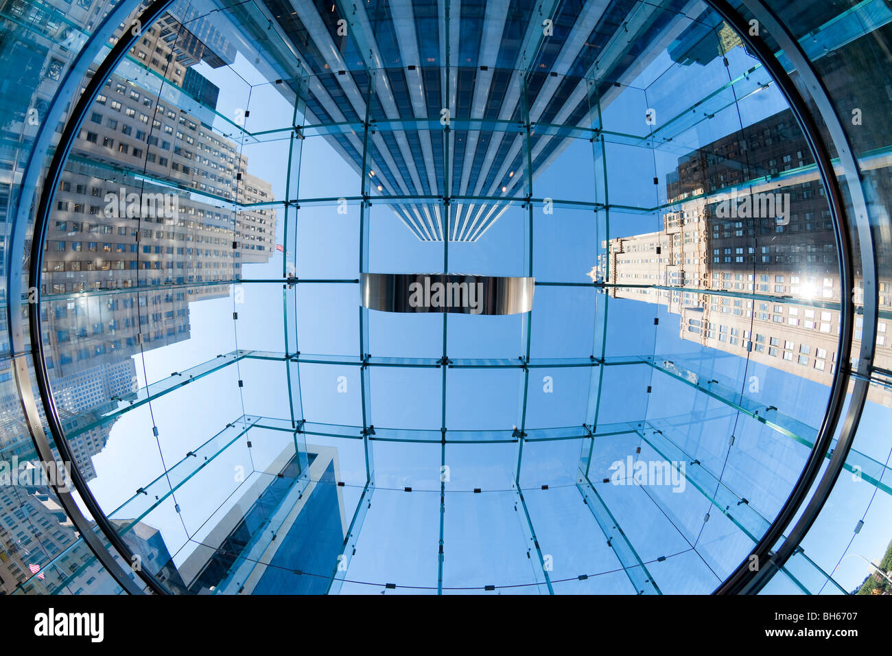 USA, New York City, Manhattan, skyscrapers of Fifth Avenue viewed from below through a glass roofed ceiling Stock Photo