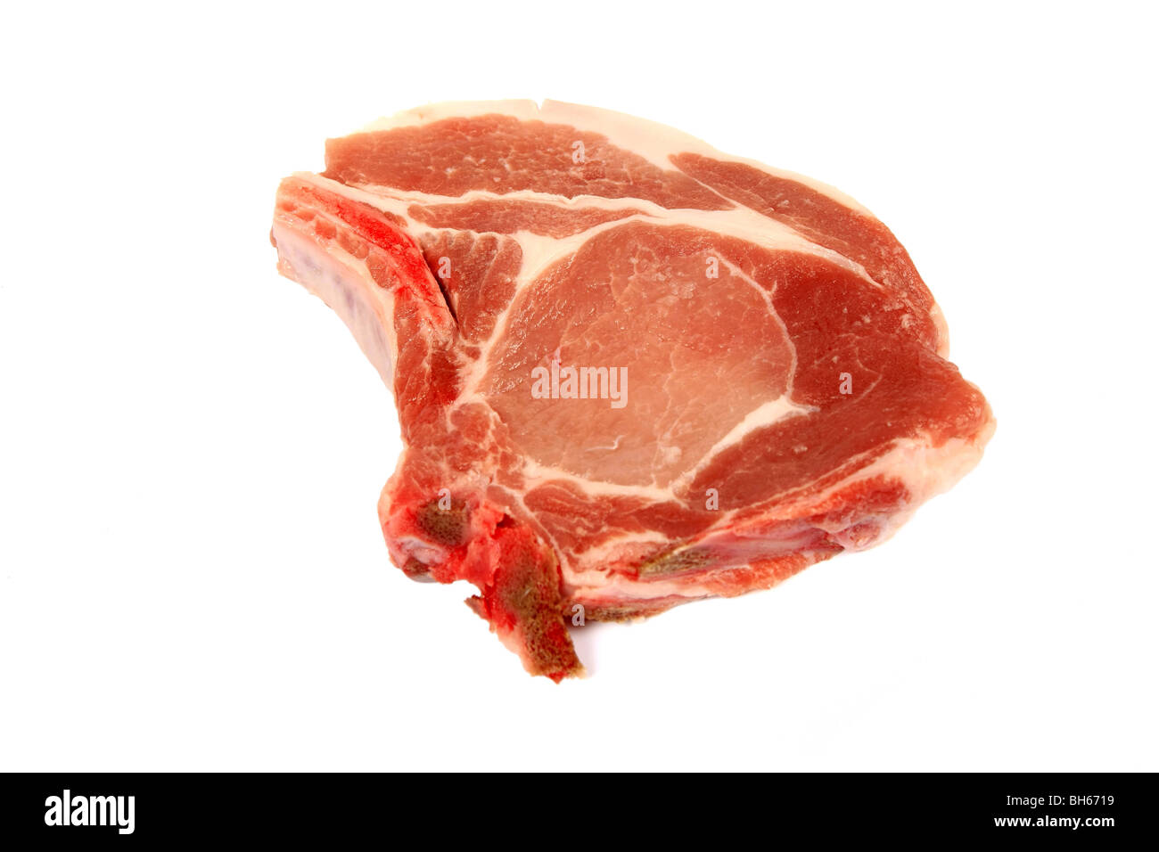 One Pork Loin chop against a white background Stock Photo