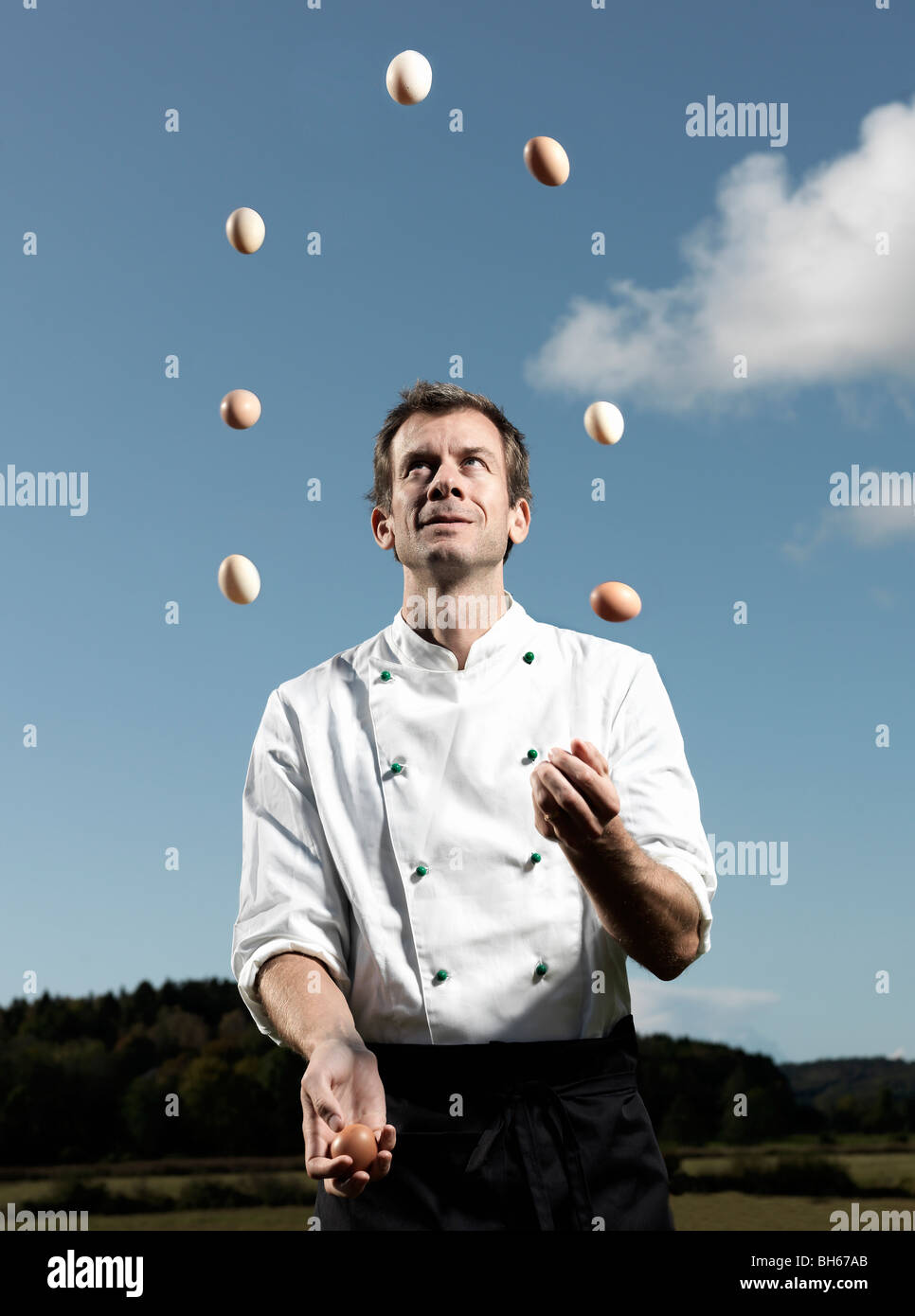 Chef juggling with eggs Stock Photo Alamy